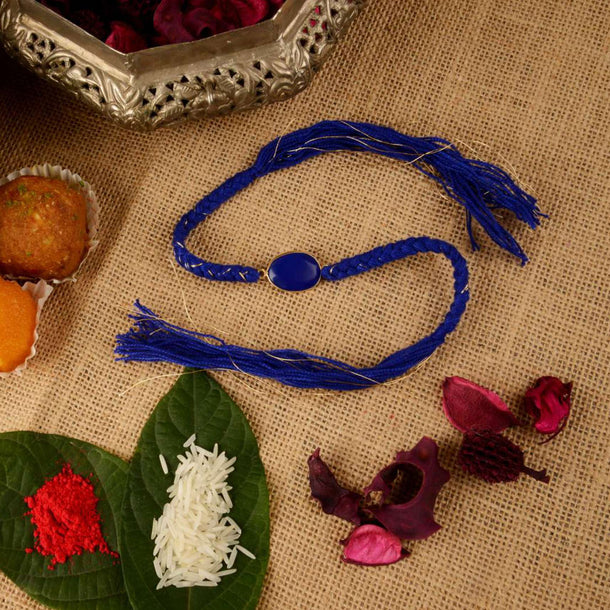 Azure Blue Braided Rakhi Enhanced In Semi-Precious Coloured Stone