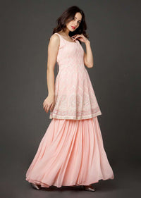 Baby Pink Palazzo Suit With Peplum Kurti Adorned With Resham Work In Chevron Pattern Online - Kalki Fashion