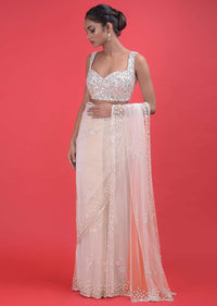 Baby Pink Saree In Net With Floral Buttis In Sequins And A Sequins Embellished Blouse Online - Kalki Fashion