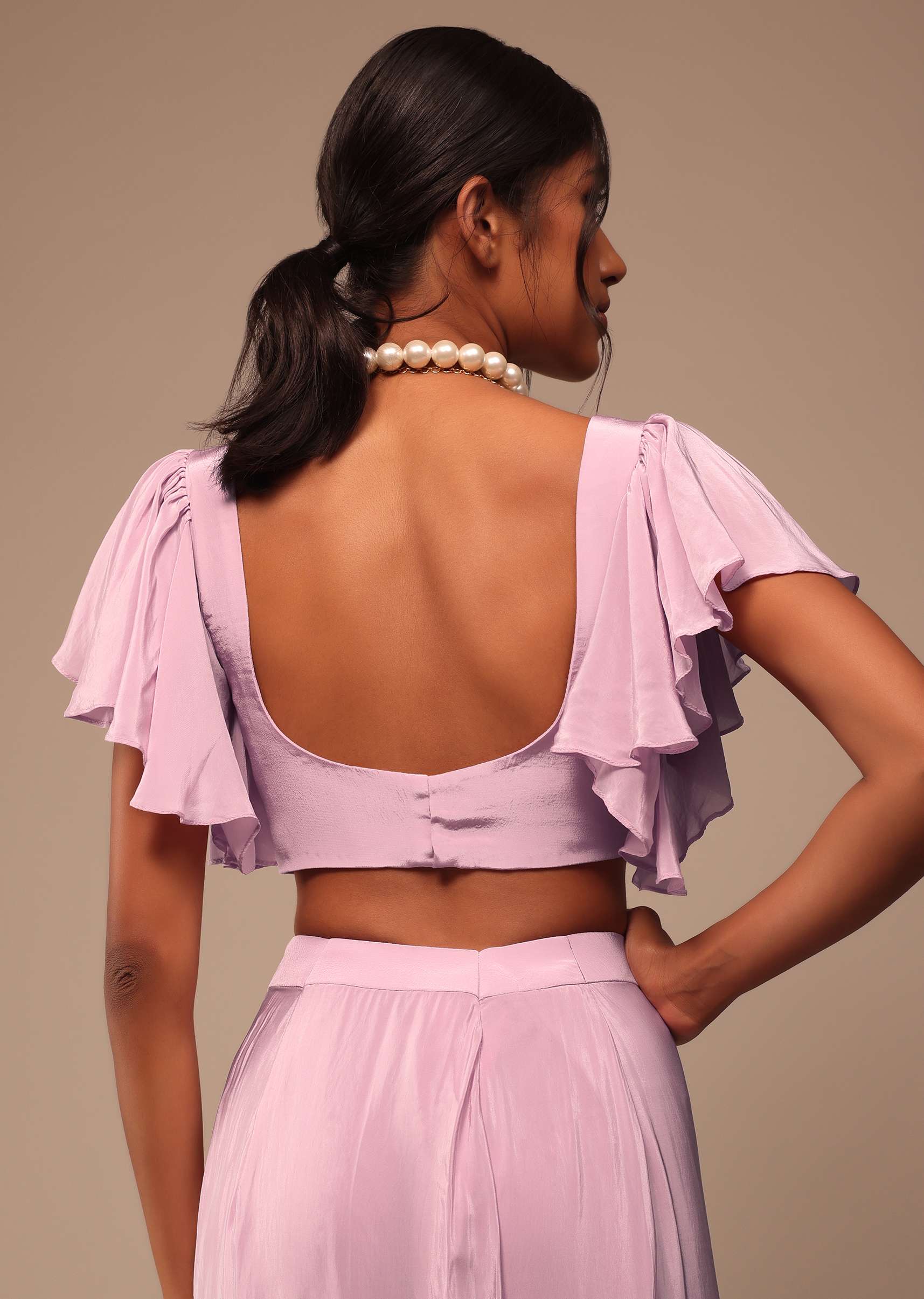 Baby Pink Crepe Saree With Fancy Bow Shaped Blouse And Belt