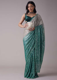 Sea Green And Silver Toned Sequins Saree With An Embellished Border