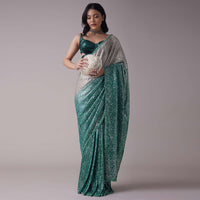 Sea Green And Silver Toned Sequins Saree With An Embellished Border