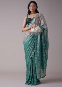 Sea Green And Silver Toned Sequins Saree With An Embellished Border