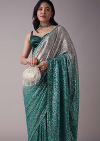 Sea Green And Silver Toned Sequins Saree With An Embellished Border