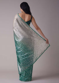 Sea Green And Silver Toned Sequins Saree With An Embellished Border