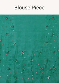 Sea Green And Silver Toned Sequins Saree With An Embellished Border