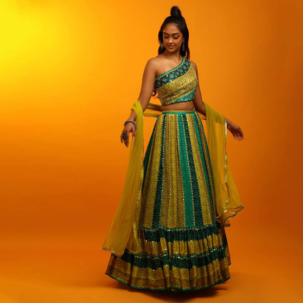 Bandhani Lehenga In Shades Of Green Georgette With Mirror Embroidered One Shoulder Choli