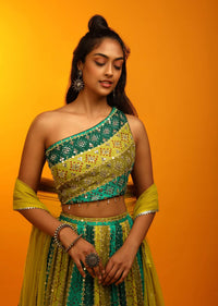 Bandhani Lehenga In Shades Of Green Georgette With Mirror Embroidered One Shoulder Choli