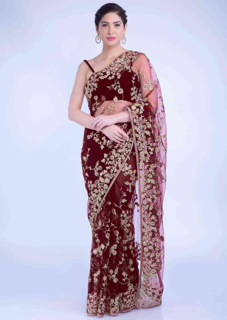 Barn red embellished net saree with matching blouse piece only on Kalki