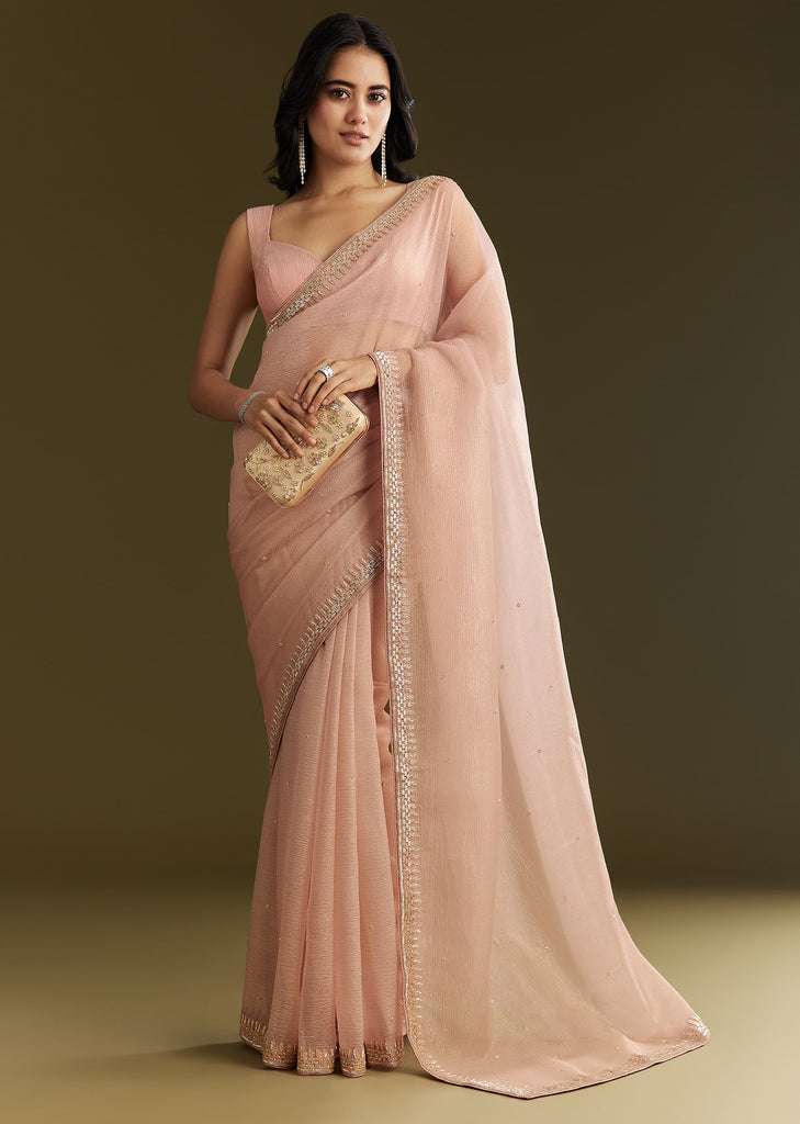 Beige Crushed Tissue Saree With Stone Embellishment And Glossy Finish