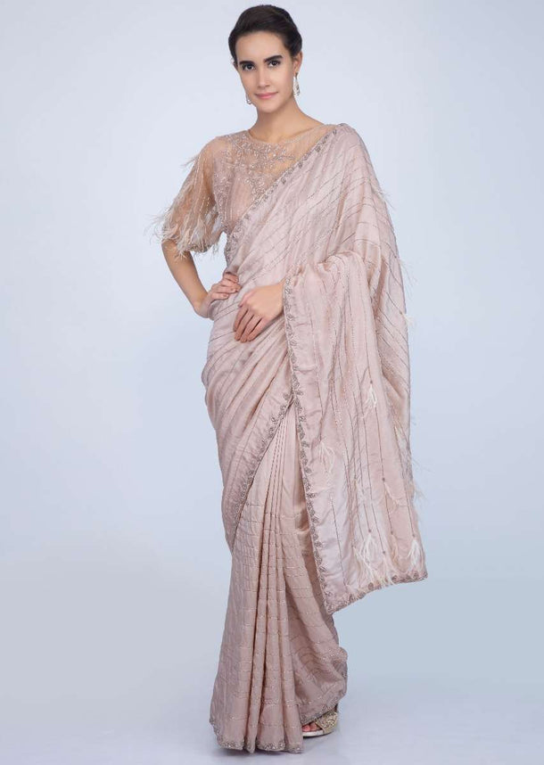 Beige silk cut dana embroidered saree with feathers only on Kalki