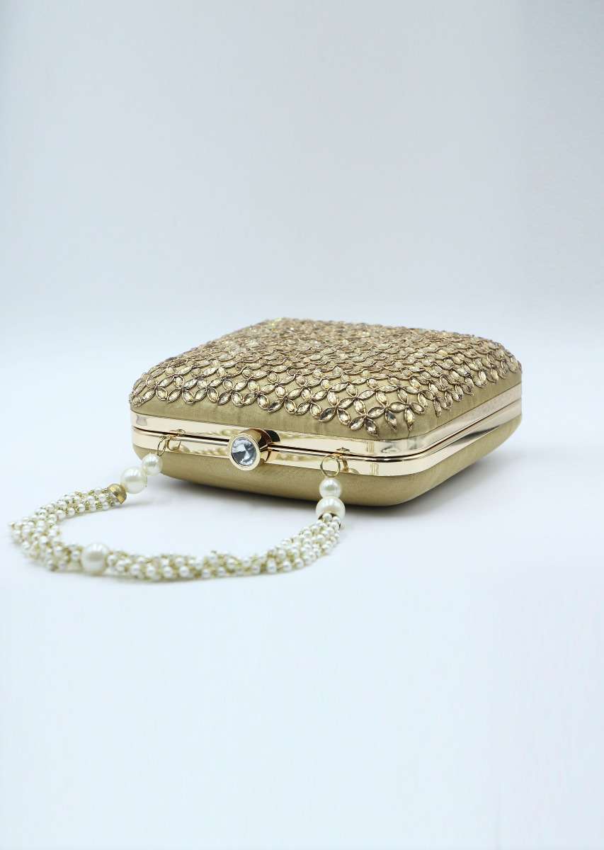 Beige silk hand embroidered clutch