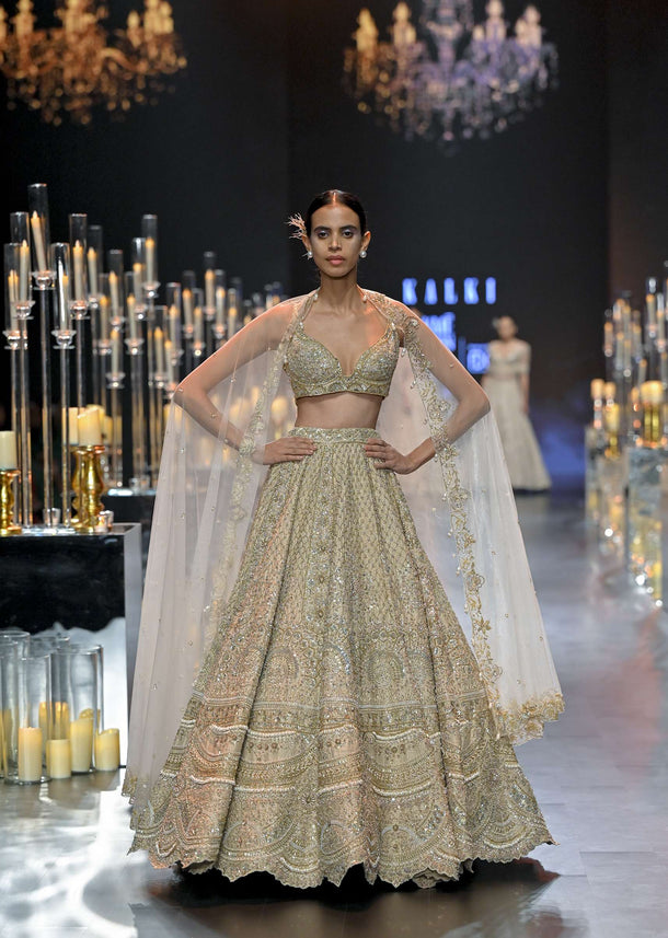 Beige Bridal Lehenga Set In Raw Silk With Jaal Embroidery And Pearl Tassels