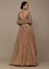 Beige Festive Sequins And Zari Embroidered Lehenga Set In Chinon