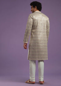 Beige Festive Textured Kurta Set With Sequins Work In Art Silk