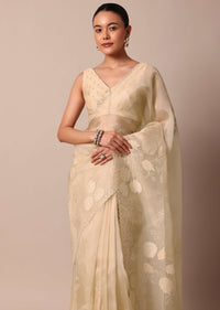 Beige Organza Silk Saree With Appliqué Work And Unstitched Blouse Fabric