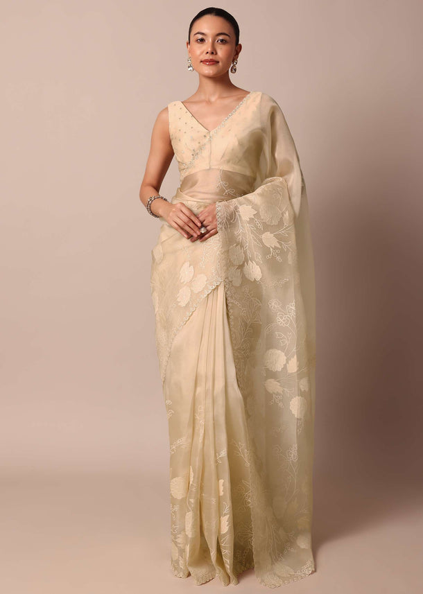 Beige Organza Silk Saree With Appliqué Work And Unstitched Blouse Fabric