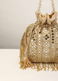 Beige Potli In Satin With Hand Embroidery Detailing Using Mirror And Cut Dana Fringes