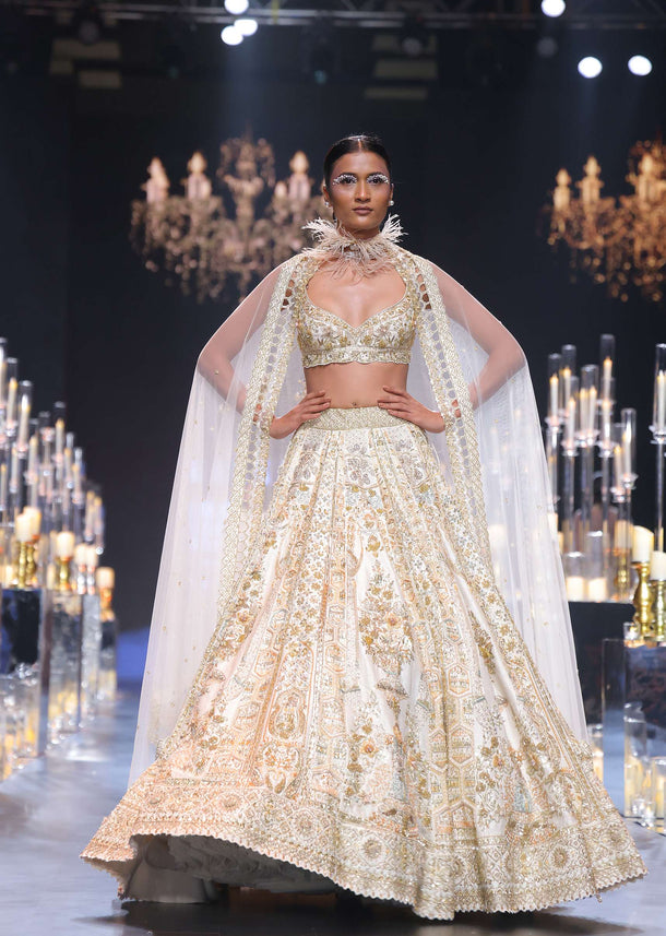 Beige Raw Silk Bridal Lehenga Set With Pearl Tassels And 3D Embroidery