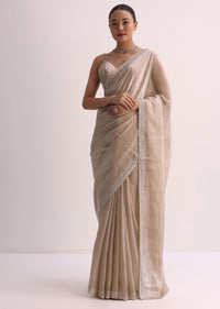 Beige Saree With Cutdana Border And Unstitched Blouse