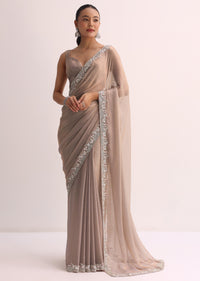 Beige Saree With Embroidered Border And Unstitched Blouse