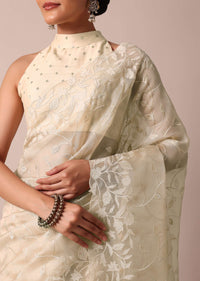 Beige Soft Organza Saree With Floral Work And Unstitched Blouse Piece