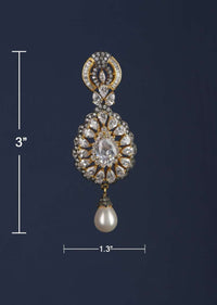 Black And Gold Plated Crystal Studded Drop Shaped Danglers With Stones And Dangling Pearl Online - Kalki Fashion