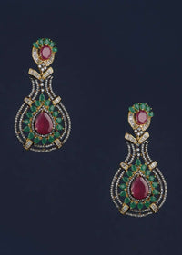 Black And Gold Plated Earrings Designed In Drop Motif With Green And Magenta Crystals, Bugle Beads And Stones Online - Kalki Fashion