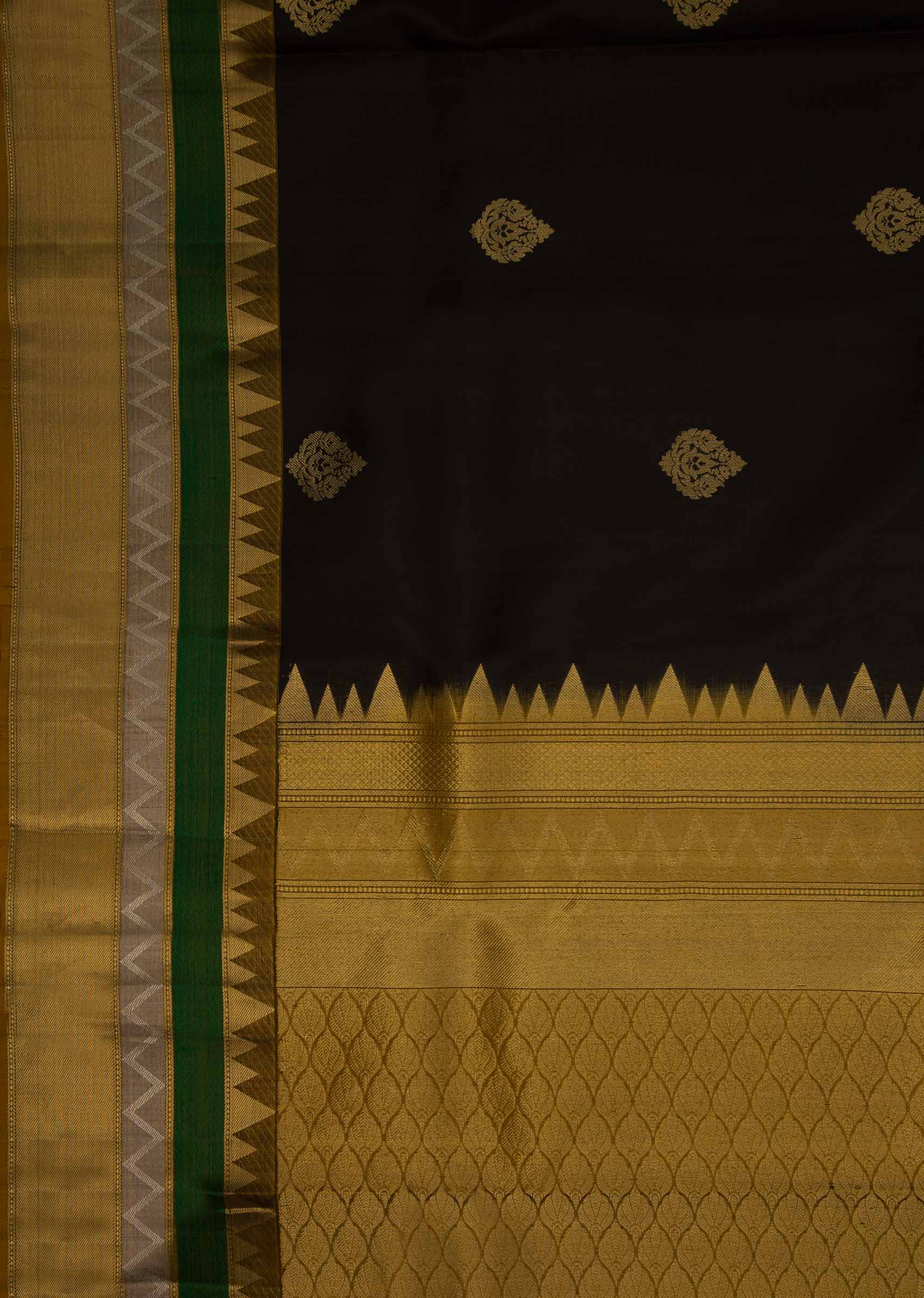 Black chanderi silk saree in weaved butti and temple borde