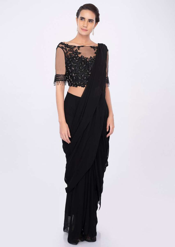 Black georgette draped saree with net embroidered blouse only on kalki