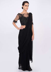 Black georgette draped saree with net embroidered blouse only on kalki