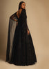 Black Gown In Sequins Embellished Net With Ruching In The Front, Sheer Sides And Net Cape On Each Shoulder