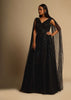 Black Gown In Sequins Embellished Net With Ruching In The Front, Sheer Sides And Net Cape On Each Shoulder