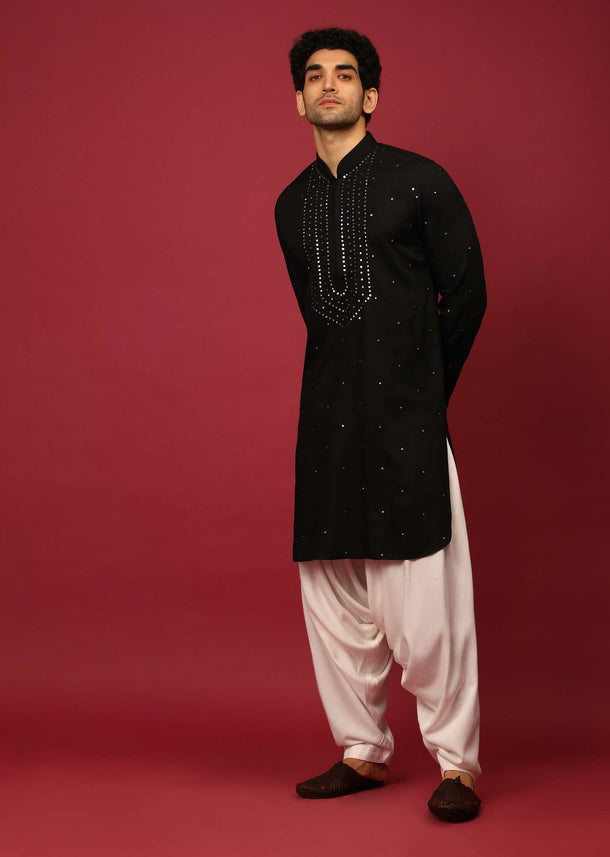 Black Pathani Suit In Cotton With Mirror And Thread Embroidered Buttis And Heavy Placket Design