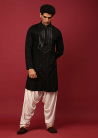 Black Pathani Suit In Cotton With Mirror And Thread Embroidered Buttis And Heavy Placket Design