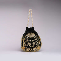 Black Potli Bag In Velvet With Hand Embroidered Floral Design Using Sequins And Zardosi