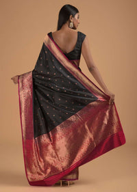 Black Pure Handloom Saree In Silk With Woven Flower Buttis And Magenta Border