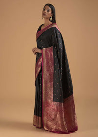 Black Pure Handloom Saree In Silk With Woven Flower Buttis And Magenta Border