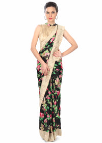 Black saree adorn in floral pinrt and silk border only on Kalki