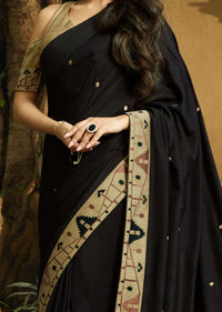 Black saree embellished in ikkat motif embroidery Online - Kalki Fashion