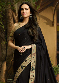 Black saree embellished in ikkat motif embroidery Online - Kalki Fashion