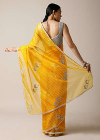 Amber Yellow Saree In Organza With Woven Checks And Stone Embellished Buttis Along With Unstitched Blouse