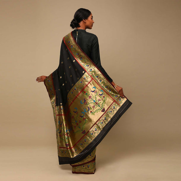 Black Saree In Art Handloom Silk With Woven Geometric Buttis, Peacock Motifs On The Border And Unstitched Blouse