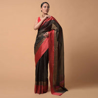 Black Saree In Zari Kota Silk With Woven Checks And Contrasting Striped Red Border