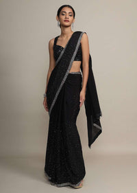 Black chiffon saree with heavy cut dana and pot embroidered border only on Kalki