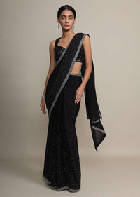 Black chiffon saree with heavy cut dana and pot embroidered border only on Kalki