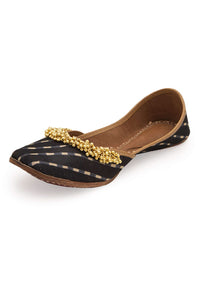 Black Geometric Print Juttis In Silk With Ghungroo Embellishment