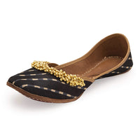 Black Geometric Print Juttis In Silk With Ghungroo Embellishment