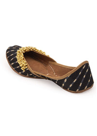 Black Geometric Print Juttis In Silk With Ghungroo Embellishment