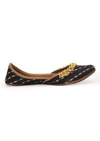 Black Geometric Print Juttis In Silk With Ghungroo Embellishment